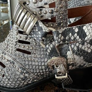 Jeffrey Campbell snake skin booties with silver hardware.